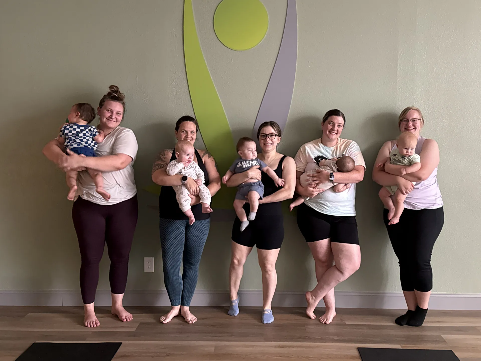 Mothers and babies together after Mom and Mini yoga.
