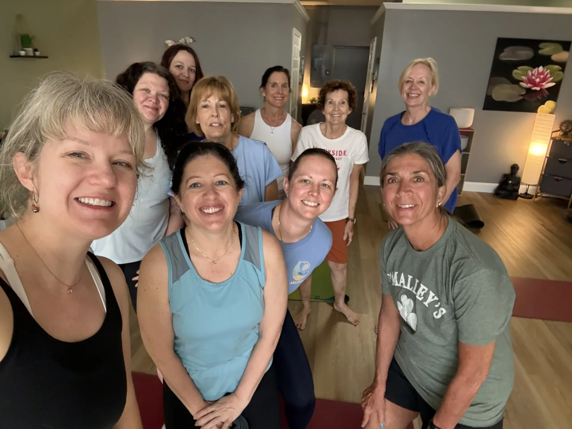 Students smiling together after an evening class.