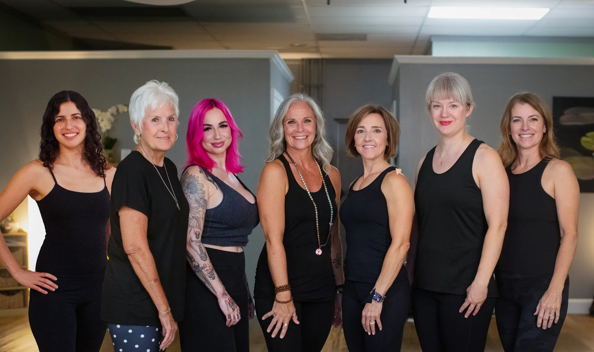 The JB Wellness instructors together in the studio.